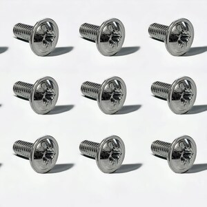 May include: Nine shiny, silver screws are arranged in a grid. Each screw has a round head with a star-shaped indentation and a threaded shaft. The screws are set against a white background.