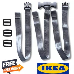May include: A set of grey and white tie-dye style straps with black plastic buckles and adjusters. The image also includes three black plastic sliders and the text "FREE DELIVERY" with an arrow, and the IKEA logo.