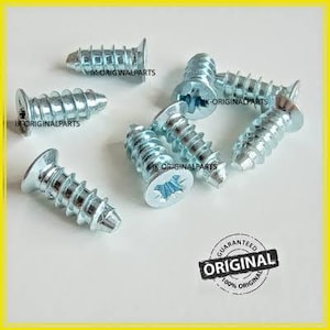 May include: A collection of silver-coloured metal screws with flat heads and deep threads, featuring a cross-shaped drive. The text IK-ORIGINALPARTS is visible on the screws, and a circular stamp reads GUARANTEED ORIGINAL 100% ORIGINAL.