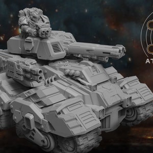 May include: A gray, futuristic-looking tank with a large cannon and multiple smaller guns. The tank has a crew compartment on top with a figure inside. The tank is on a dark background with a logo that says "ATLAN FORGE".