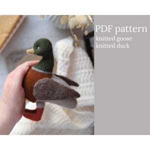 Knitting goose pattern. Knitted duck. Amigurumi toy