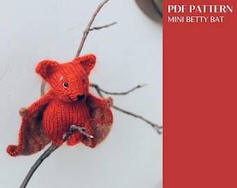 Betty Bat knitting pattern. Knitted Halloween bat step-by-step tutorial. DIY Halloween decor. English and Russian PDF.