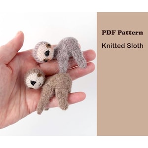 May include: Three small, knitted sloth toys in shades of gray and brown are displayed. The sloths have detailed faces with black eyes and beige accents. The image includes the text "PDF Pattern Knitted Sloth."