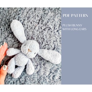 Plush bunny with long ears knitting pattern. English and Russian PDF.