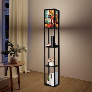 May include: Black floor lamp with a geometric patterned lampshade featuring cats. The lamp has a shelf unit with four shelves for storage.