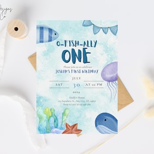 May include: A blue and white invitation for a first birthday party with the text "O-FISH-ALLY ONE" and "Joseph's First Birthday". The invitation features a watercolor background with a fish, a whale, a jellyfish, and seaweed.