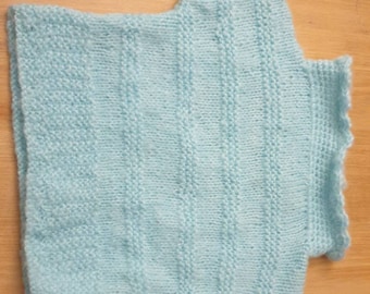 Self-knitted baby clothes