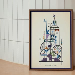 May include: Framed art print featuring a colorful, abstract architectural design with geometric shapes in blue, purple, and green. The artwork includes the text "HURRY BACK!" at the bottom, set against a cream background, framed in a dark wood.