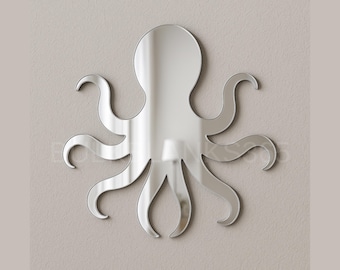 May include: A silver octopus wall mirror with eight curved tentacles. The mirror is mounted on a light beige wall. The octopus design is a decorative element for home decor.