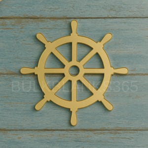 May include: A gold-colored ship's wheel, a nautical decorative element, is centered on a weathered, light blue wooden surface. The wheel features eight spokes and a central circular hub. The image has a nautical theme.