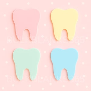 May include: Four colorful tooth-shaped cutouts in pink, yellow, mint green, and blue are arranged on a pink background with white polka dots. The teeth are evenly spaced and have a smooth, matte finish. The image has a playful and cheerful aesthetic.
