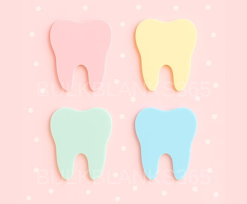 May include: Four colorful tooth-shaped cutouts in pink, yellow, mint green, and blue are arranged on a pink background with white polka dots. The teeth are evenly spaced and have a smooth, matte finish. The image has a playful and cheerful aesthetic.