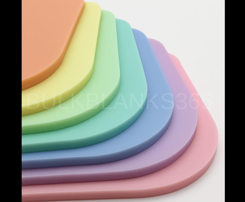 May include: A stack of colorful, rounded-corner rectangles in a rainbow of pastel shades: peach, yellow, green, teal, blue, lavender, and pink. The image includes the text "BULKBLANKS365".