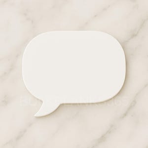 May include: A white speech bubble with a rounded rectangular shape and a small tail on the bottom left. The background is a marble pattern.