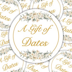 May include: White circular stickers with gold text reading "A Gift of Dates". The stickers feature a gold border and floral decorations. The stickers are arranged in a scattered pattern.