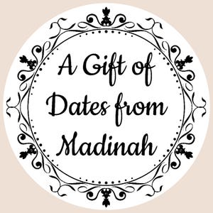 May include: A white circular sticker with a black ornate border and the text "A Gift of Dates from Madinah".