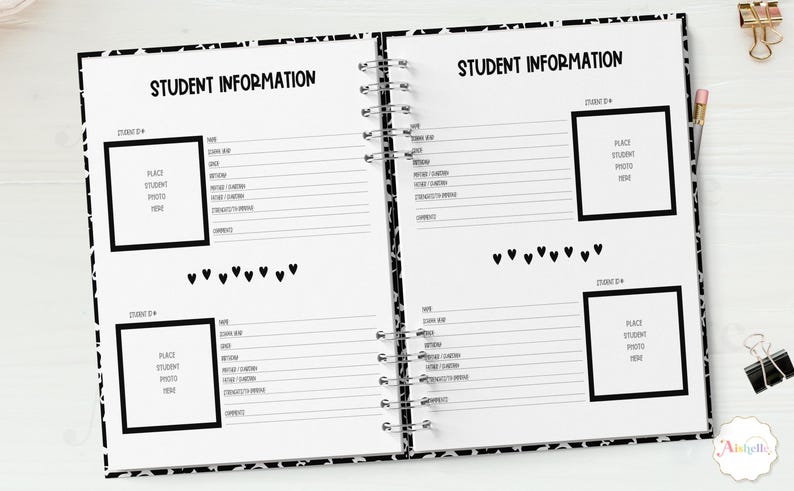 May include: Open notebook with student information pages. Each page has a black and white patterned border, with the words "STUDENT INFORMATION" at the top. There are spaces for photos and student details.