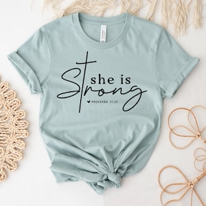 She Is Strong T-shirt, Christian Shirt, Faith Gift, Religious Tee, Christian Top, Women Tee, Bible Gift, Mothers Day Shirt, Girl Power shirt