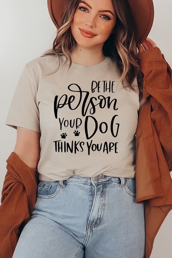 Be The Person Your Dog Thinks You Are Paw Print T-Shirt Be The Person Your Dog Thinks You Are Paw Print T-Shirt