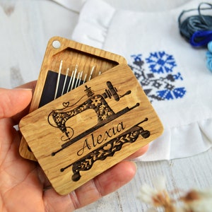 wooden needle box with engraved sewing machin and name