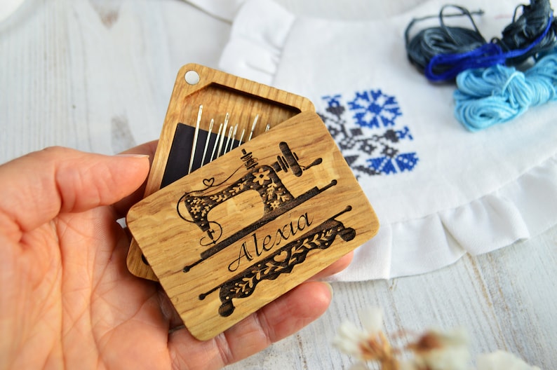 wooden needle box with engraved sewing machin and name