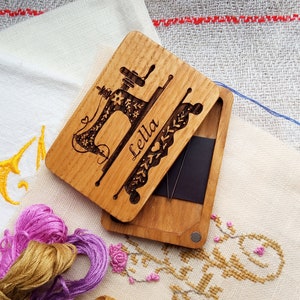 wooden needle box with engraved sewing machin and name