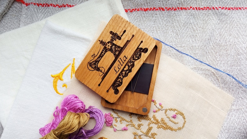 wooden needle box with engraved sewing machin and name