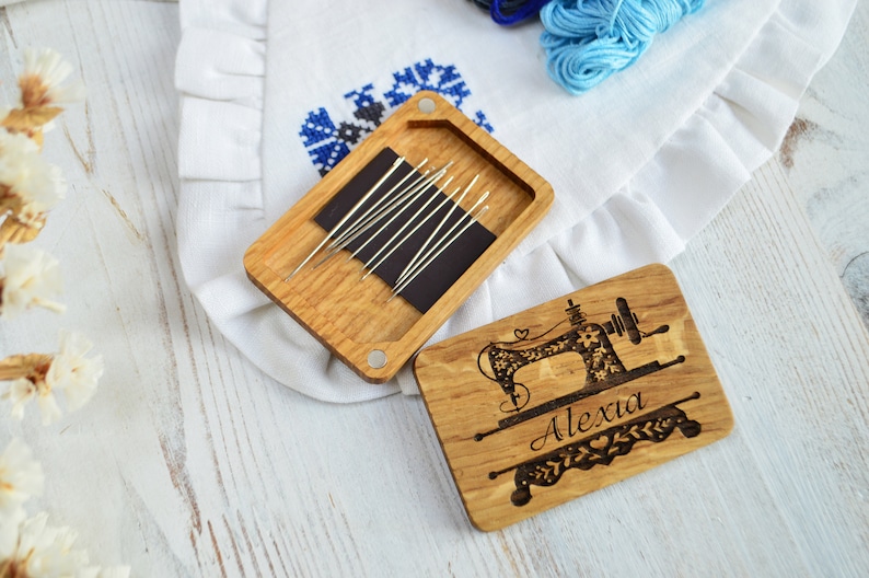 wooden needle case with the engraving sewing machine and the name