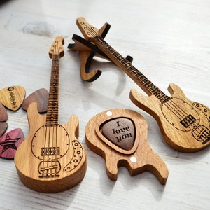 bass guitar shaped box with guitar picks and stand