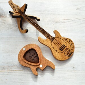 guitar shaped box with walnut pick and stand