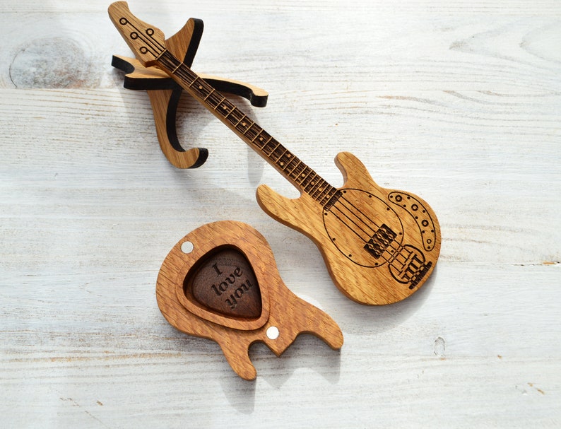 guitar shaped box with walnut pick and stand