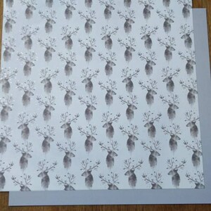 12 x 12 Winter Reindeer Cardstock with complementary neutral sheets
