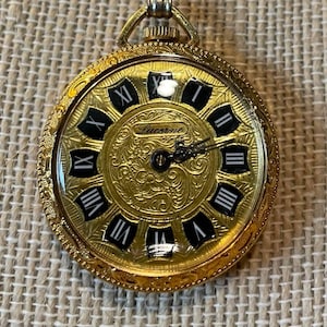 Lucerne swiss pendant watch deals