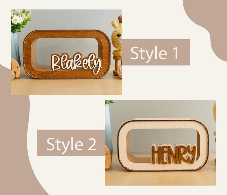 May include: Two wooden boxes with a cutout in the front. The boxes are made of natural wood and have a light brown finish. The first box has the name "Blakely" written in white letters on the front. The second box has the name "Henry" written in brown letters on the front. The boxes are labelled "Style 1" and "Style 2".