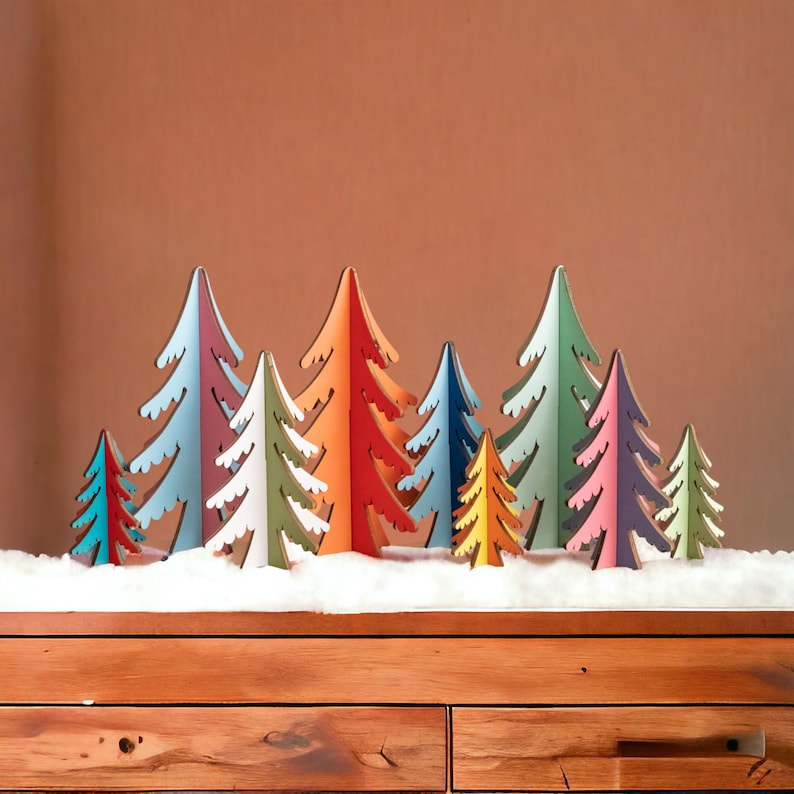 Nine colorful wooden Christmas trees