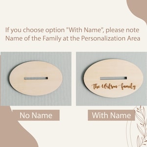 May include: Two oval wooden signs, one with the text "The Wilson family" engraved on it and the other with a blank space for personalization. The signs are on a light gray background.
