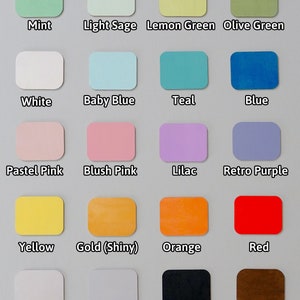 May include: A chart of 16 color swatches with the names of each color written below. The colors include mint, light sage, lemon green, olive green, white, baby blue, teal, blue, pastel pink, blush pink, lilac, retro purple, yellow, gold (shiny), orange, red, silver (shiny), grey, black, and brown.