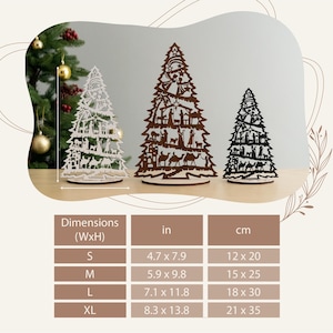 May include: Four wooden Christmas tree ornaments in different sizes, with a nativity scene design. The trees are in the colors brown and white, and are shown on a white surface. The sizes are labeled as S, M, L, and XL, with dimensions in inches and centimeters.