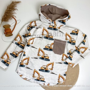 Könnte beinhalten: Weißer Kapuzenpullover mit einem Muster aus gelben und schwarzen Bau-Baggern. Der Pullover hat eine braune Tasche und ein braunes Innenfutter in der Kapuze. Die Ärmel sind lang und das Design ist auf der Vorderseite und den Ärmeln aufgedruckt.