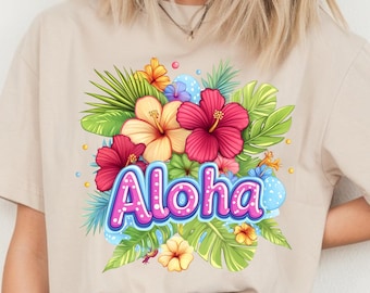 May include: A beige t-shirt with a colorful floral design and the word "Aloha" in pink with white polka dots.