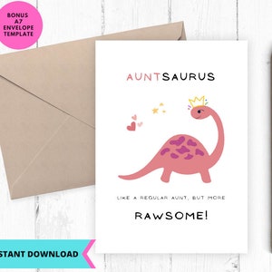Op de afbeelding: Een witte kaart met een roze dinosaurus met een kroon en de tekst "AUNTSAURUS" en "LIKE A REGULAR AUNT, BUT MORE RAWSOME!"