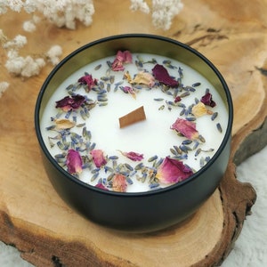 Natural soy wax candle with dried flowers and herbs
