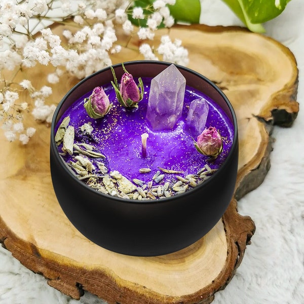 Magical soy wax candle with crystals and dried herbs