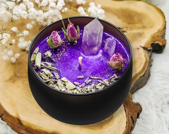 Magical soy wax candle with crystals and dried herbs