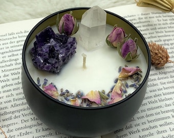 Scented candle with dried flowers and gemstones