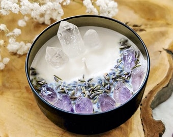 Scented candle with dried flowers and gemstones