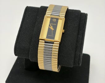 Gruen Quartz Rectangular Watch Gold Tone Black Dial Stretch Band Mens