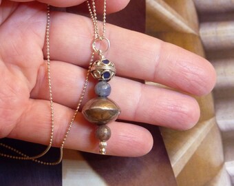 Sacred amulet: cordierite iolite pendant / pendulum, ethnic beads and silver beads - 5th throat chakra release of expression