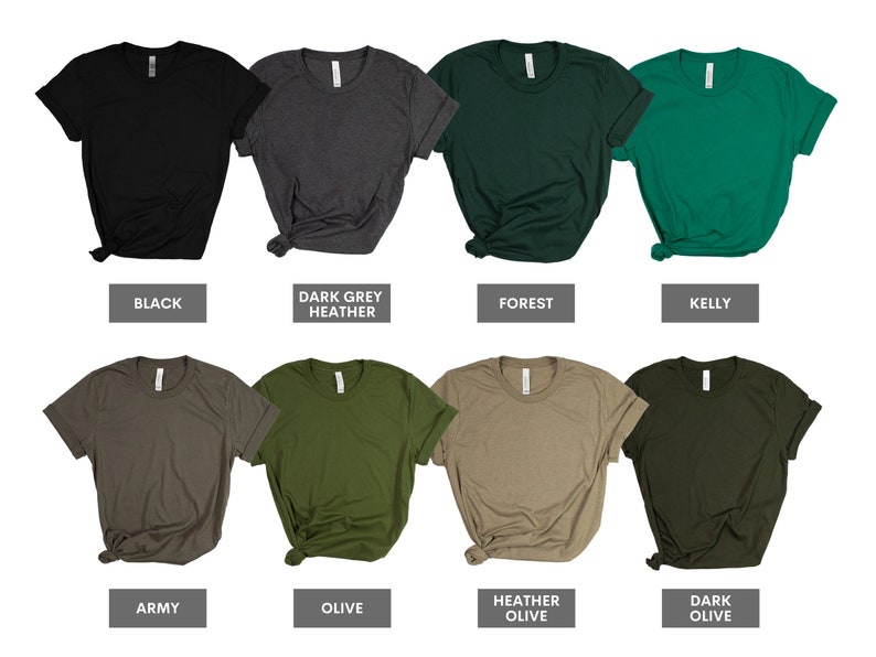 May include: A set of ten blank t-shirts in various colors, including black, dark grey heather, forest, kelly, army, olive, heather olive, and dark olive. The shirts are all folded and laid out on a white background.