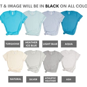 May include: A selection of ten t-shirts in various colours, including turquoise, heather ice blue, light blue, aqua, natural, silver, athletic heather, and ash. The text "TEXT & IMAGE WILL BE IN BLACK ON ALL COLORS" is displayed at the top of the image.